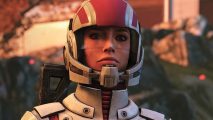 BioWare's best RPGs are astronomically cheap in massive EA Steam sale: Ashley Williams stands on Eden Prime and looks slightly off to the top right of the screen, fully armored, with a gun slung over her shoulder.