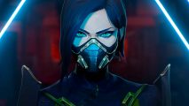 While new FPS games struggle, Riot says Valorant is okay: A white woman wearing a futuristic gas mask with green eyes and her hair in a bob frowns into the camera as blue neon lights shine on either side of her