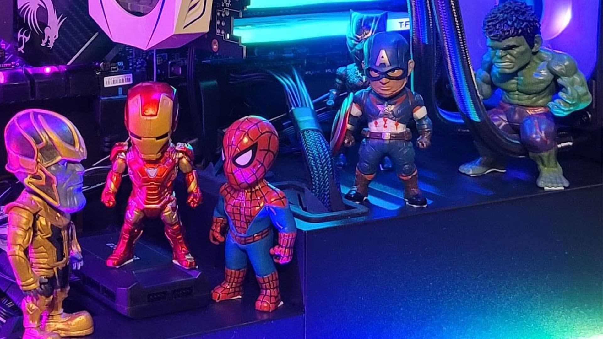 The Avengers figures inside the gaming PC