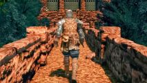 Dark Souls Remastered just got remastered again with new free mod: A knight, seen from behind, walking down a stone path, from Dark Souls Remastered.