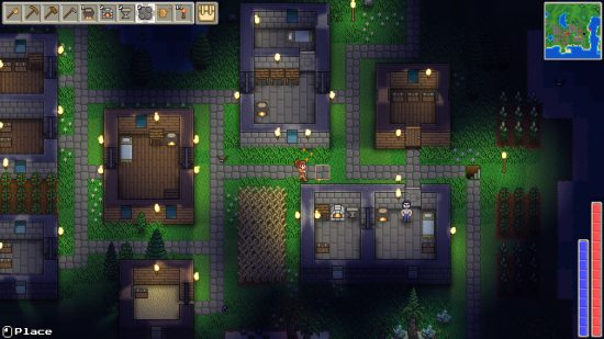 Delverium - A small town, lit at night by torches, with many buildings laid out and connected by stone paths.