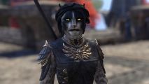 ESO and how ZeniMax Online Studios chooses where new chapters are set: Ember from ESO stands in conversation with the playing, looking a little unhappy.