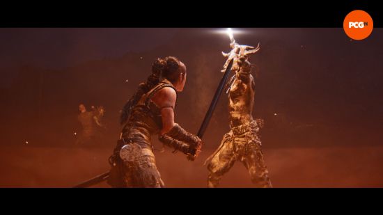 Best new PC games: a woman stands in a dimly lit space, sword in hand. In front of her is a fierce enemy wearing the skull of a large animal.