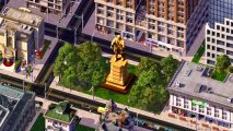 The best city building game ever is yours for 75% off right now - A golden statue the midst of a high-rise SimCity 4 city.