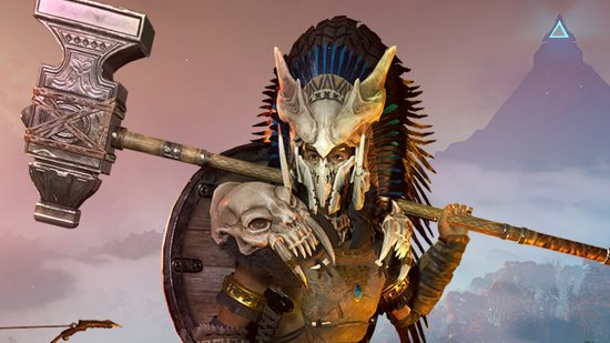 New colossal multiplayer survival sandbox launches free open playtest: A mask wearing tribesperson stands in front of a mysterious mountainous city, wielding a two-handed hammer.