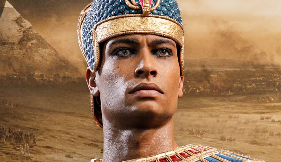 Total War Pharaoh gets much bigger with huge free update: A Pharaoh stands among desert sands and looks out.
