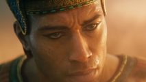 Total War Steam sale: a man in pharaoh garb looks down slightly