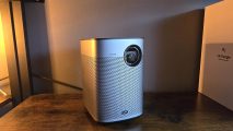 The Xgimi Halo+ projector in a dim room