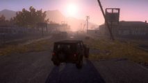 A rising sun over a Humvee in zombie game H1Z1.