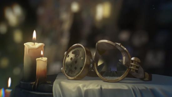 A shattered pair of goggles rest in a candle-lit cavern with some kind of picture-covered shrine in the background.