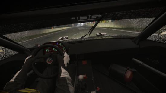 Interior view of a race car in the rain.