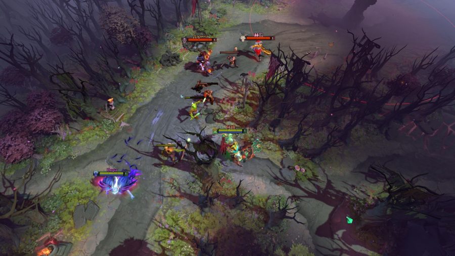 The laning stage of a Dota 2 game; two heroes on each team battle it out for the last hits on creeps