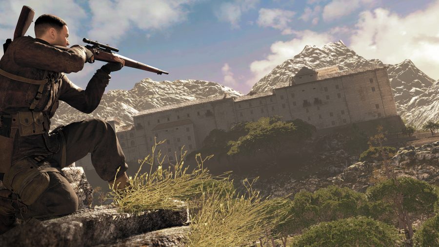 A sniper takes aim at a building in the distance in Sniper Elite 4, one of the best sniper games