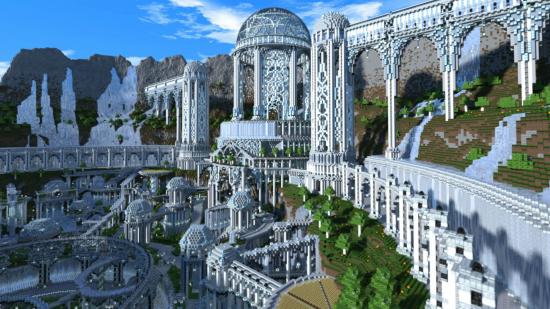Adamantis best Minecraft builds: The fantastical city of Adamantis featuring intricate, white architecture with a domed roof surrounded by mountains.