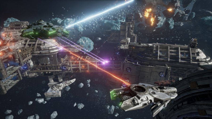 Lasers shoot across an asteroid field in one of the best free PC games, Dreadnought