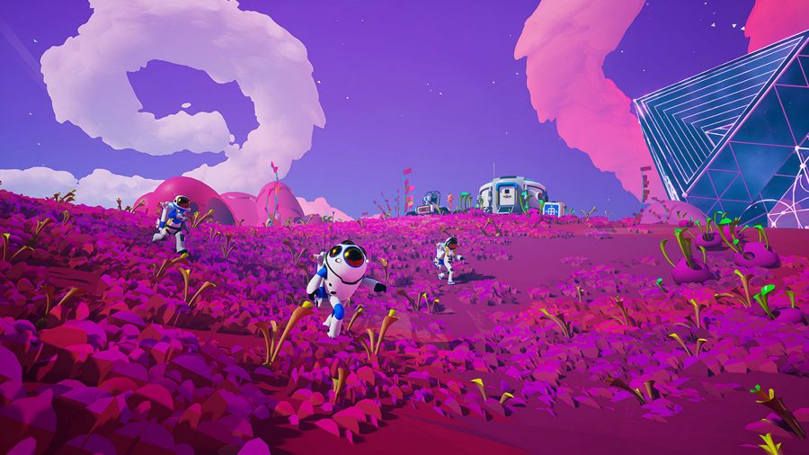 Players run through a vibrant pink landscape in Astroneer, one of the best survival games