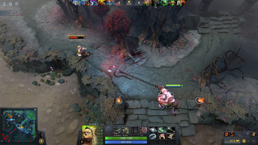 Pudge throws a hook at Bounty Hunter in one of the best free PC games, Dota 2