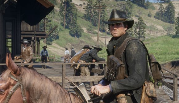 A cowboy riding a horse into town
