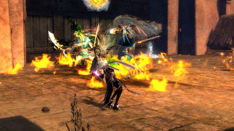 Two players battle two larger enemies in Guild Wars 2