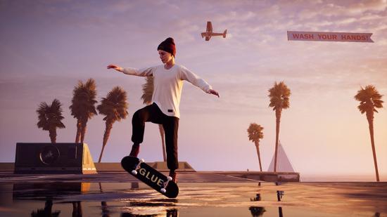 A skateboarder doing the sickest of heelflips on Venice Beach. A plane flies overhead.