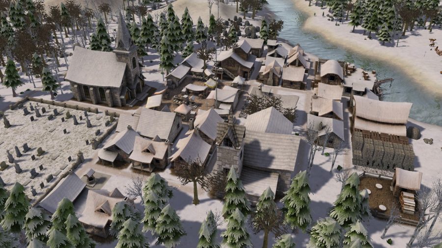 a medieval looking village covered in snow