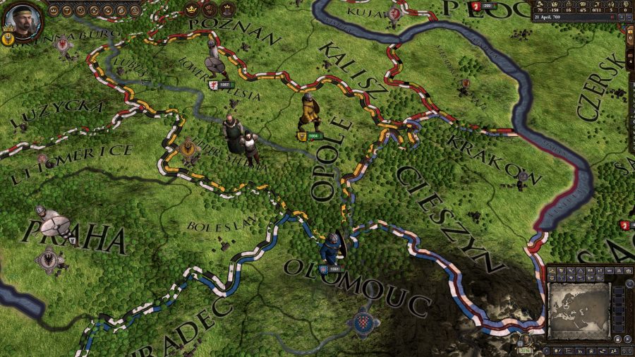 The player's map is focused around Krakow. Various units from different nations are milling around, while some peasants stand there looking worried about their future.