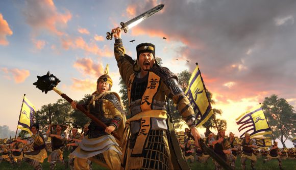 two warriros in yellow, weapons raised, leading an army