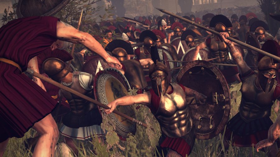 A very small group of peasants are being speared by a large army of Spartans. The Spartans are wearing helmets that cover their face.