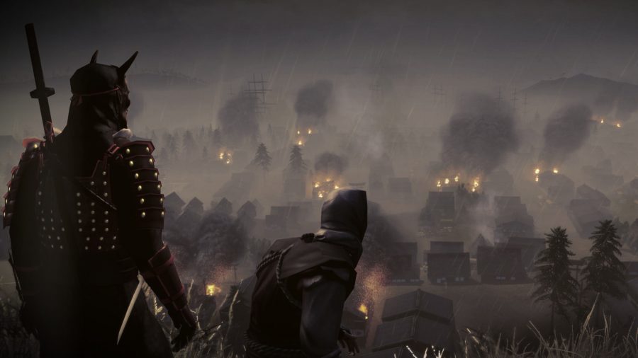 Two hooded figures look on as a town smoulders in the distance in the dead of night. It is raining, but it doesn't seem to be helping with the fires.