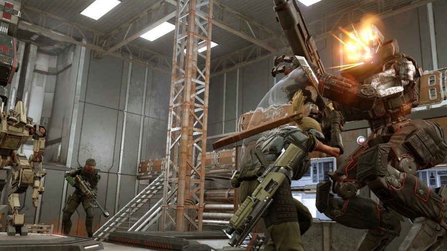 a soldier slices the head off an enemy robot. another warrior looks on in the background