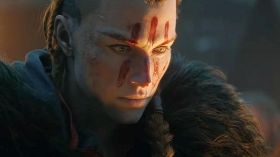 A close-up shot of Eivor wearing red face paint in Assassin's Creed Valhalla.