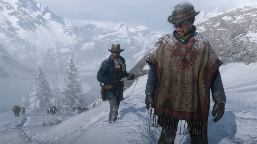 Two cowboys in Red Dead Redemption 2, one of the best sandbox games, walking through snow.