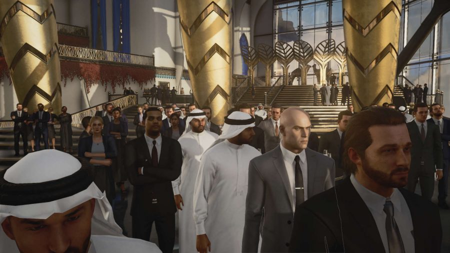 Agent 47 attending a party in Dubai in Hitman 3, while on the hunt for the keypad safe code.