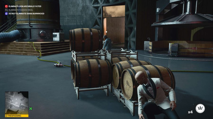 Agent 47 is hiding in a distillery while on the way to unlock one of the keypad codes in Hitman 3's Mendoza mission.