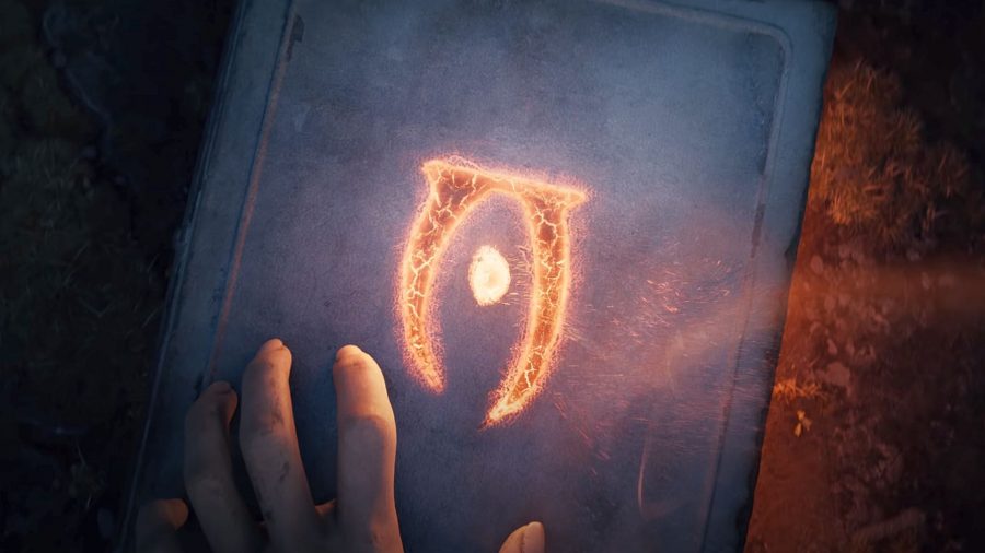 The book of Oblivion with a glowing Oblivion symbol on the cover