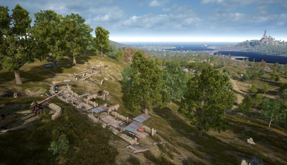 A wide shot of one of PUBG's green, forest-heavy maps