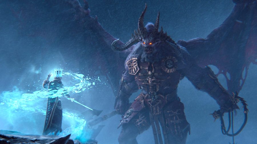 In Total War: Warhammer 3, a Bloodthirster confronts Tsarina Katarin of Kislev as she prepares to cast an ice spell
