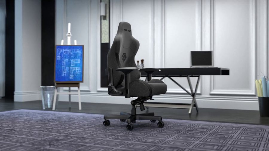 Andaseat's black fabric T-Pro 2 gaming chair sits in the middle of an office