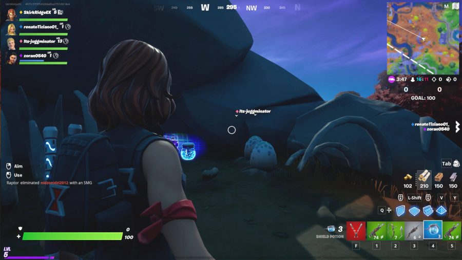 The player is looking at some eggs hidden behind a rock in Fortnite, just southeast of the Spire.