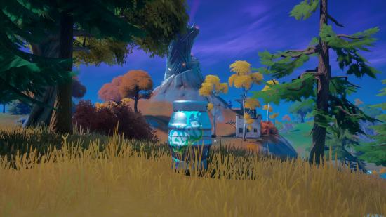 A player is using a Slurp Barrel prop disguise in Fortnite while standing near a spire.