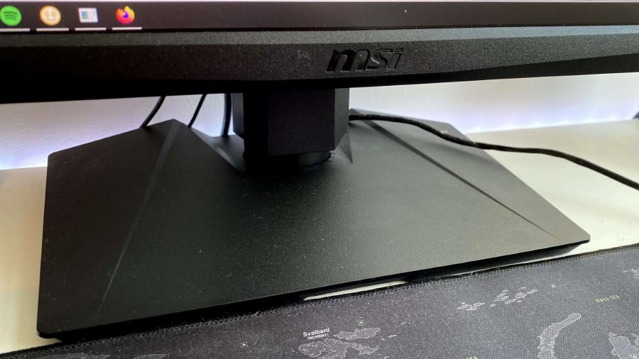 A close up of the square stand on MSI's new monitor