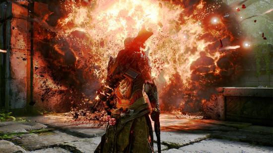 An Outrider holding a pistol and standing in front of a huge, firey explosion