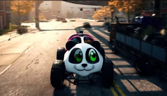 A car with a large panda's face on the front speeding down a city road