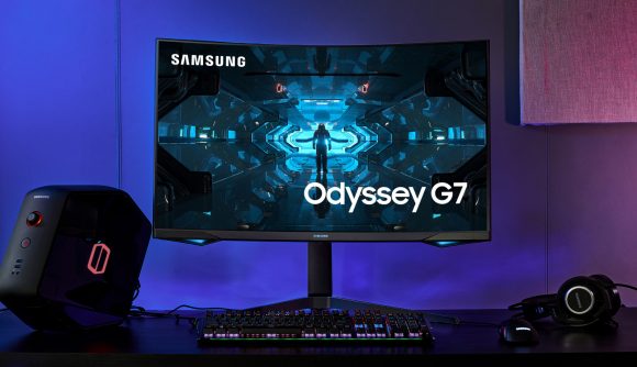 Samsung's Odyssey G7 gaming monitor sits on top of a desk with blue and pink backlighting