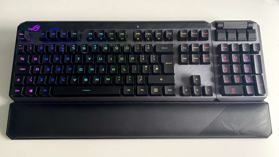 A full-size black keyboard with an aluminium topping and rainbow RGB lighting enabled