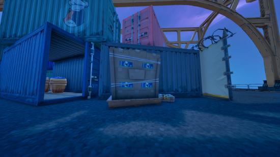 A batch of Fortnite cat food you can collect next to a container in Dusty Docks.