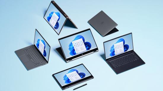 A group of Surface laptops and tablets run Microsoft Windows 11