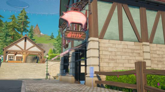 An outline for a Fortnite missing persons sign in Misty Meadows outside a butchers shop.
