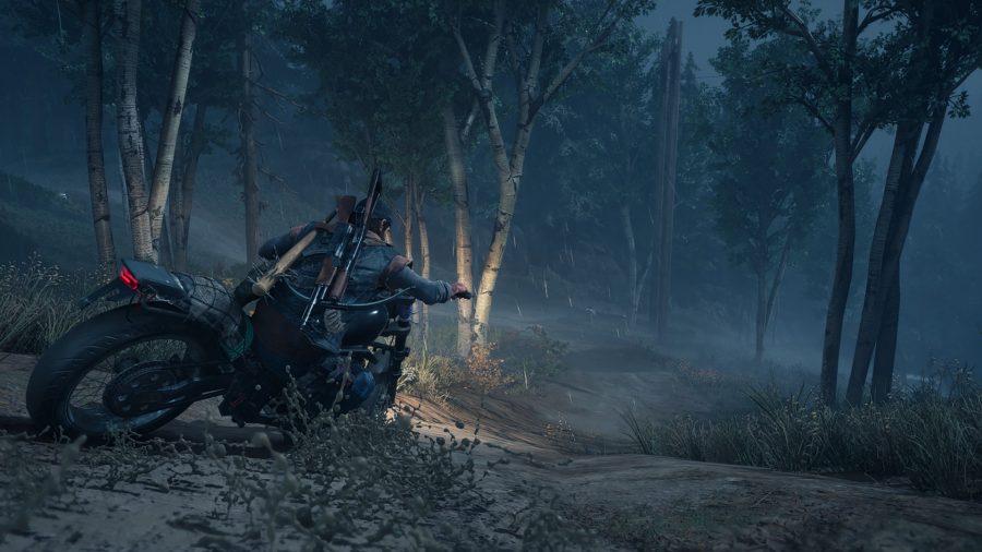 Deacon St. John sliding around a forest on his motorcycle in Days Gone