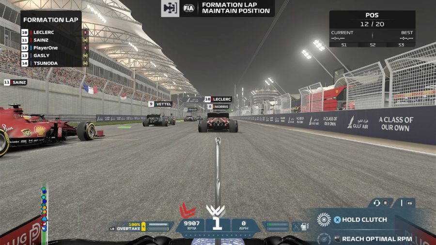 Race around a track at night in F1 review 2021
